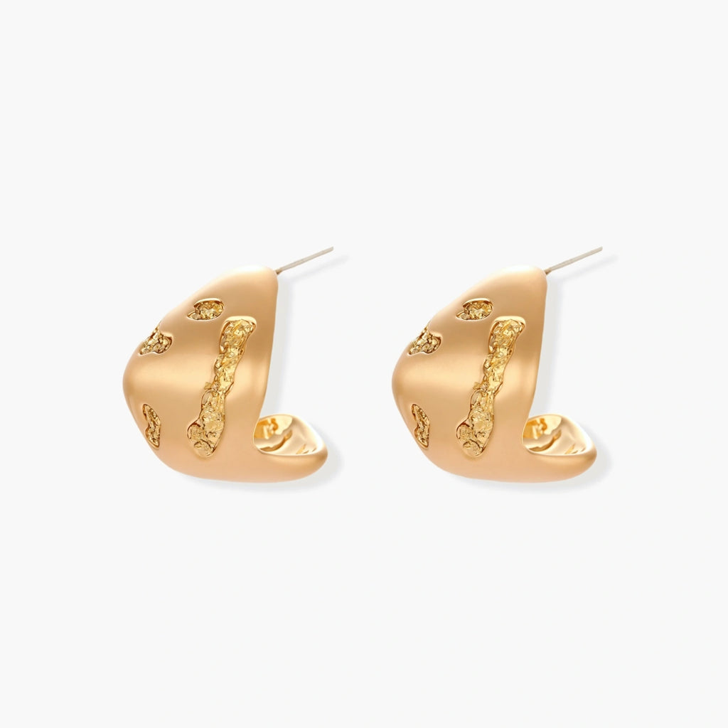 Organic-shaped stud earrings with flowing textural waves in eco-zinc alloy, featuring artistic curved design