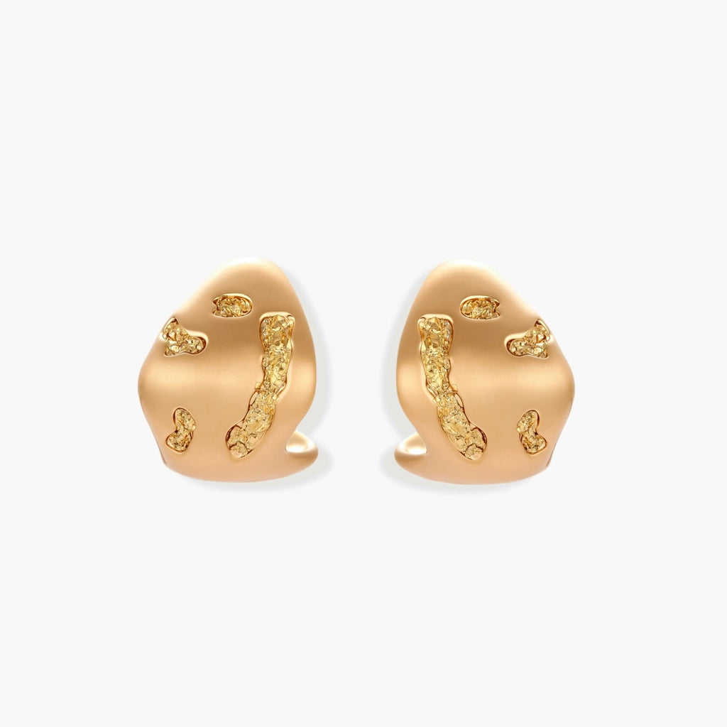 Organic-shaped stud earrings with flowing textural waves in eco-zinc alloy, featuring artistic curved design