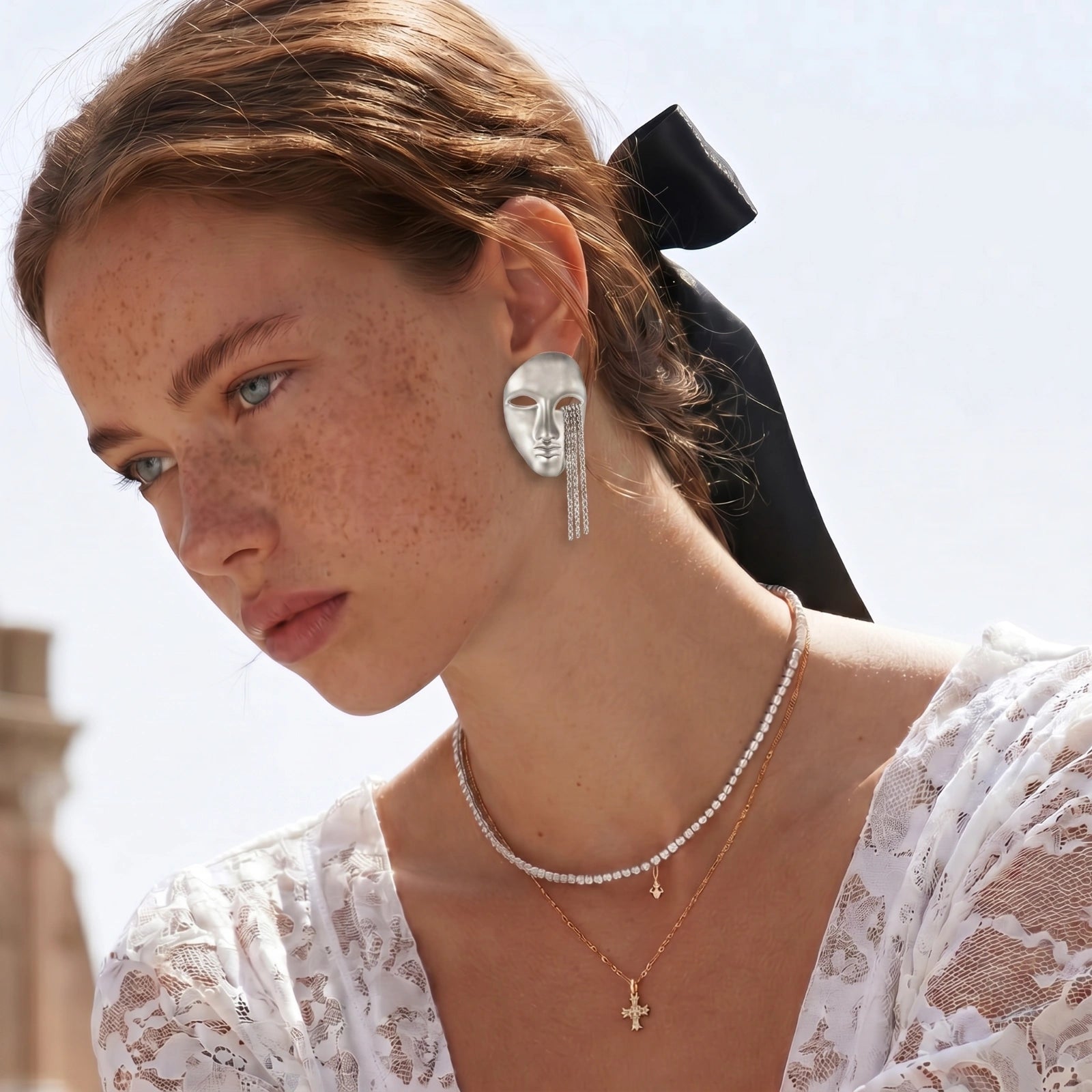 Pendientes de Cadena con Rostro Surrealista