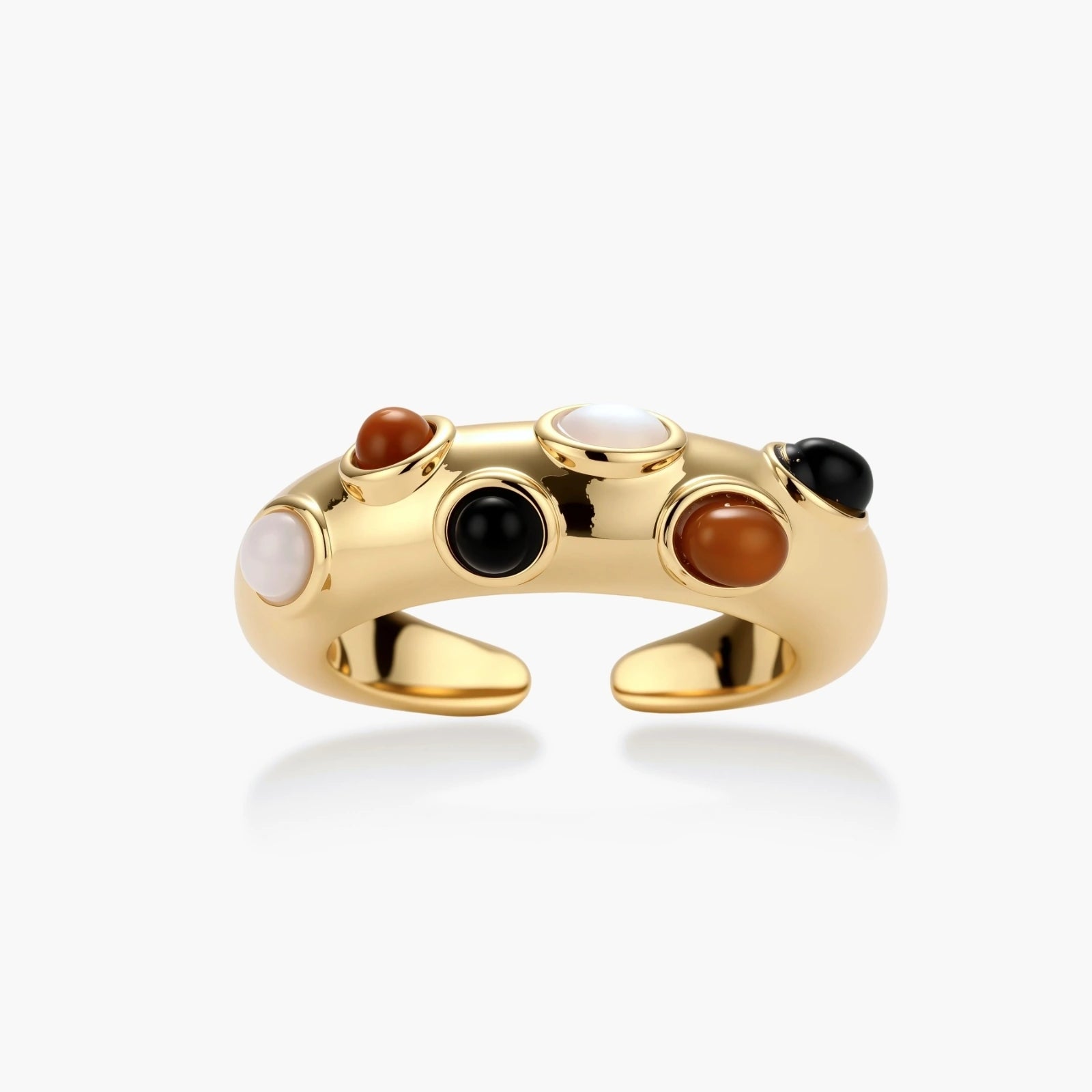 Gold-plated adjustable ring with white, amber, and black stones in organic bubble design on neutral background.